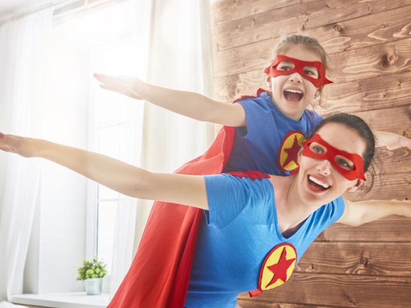 girl-and-mom-in-superhero-costumes-PBRDQL8